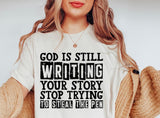 God is Still Writing Tee